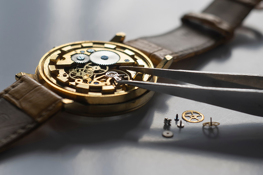 Watchmaker repair mechanical watches. Gears repair. Watch repair process - Highland, IL